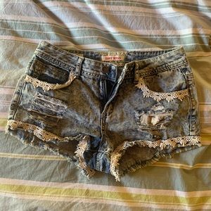 Distressed shorts with lace detail